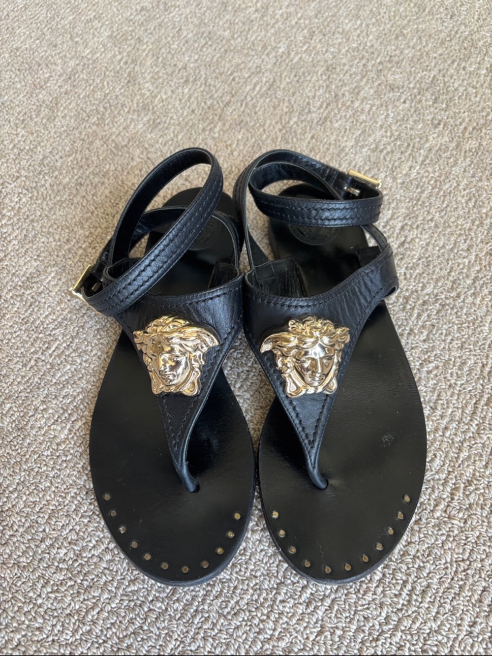 Versace Black Leather Ankle-Strap Thong Sandals with Gold Medallions